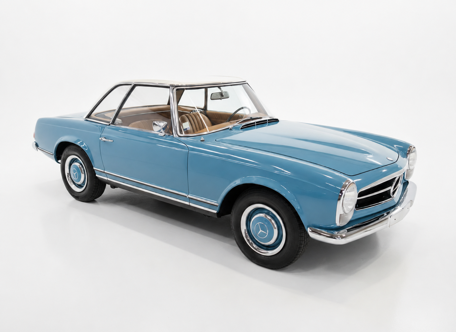The 1965 Mercedes-Benz 230 SL Pagode in Horizon Blue, front three-quarter view