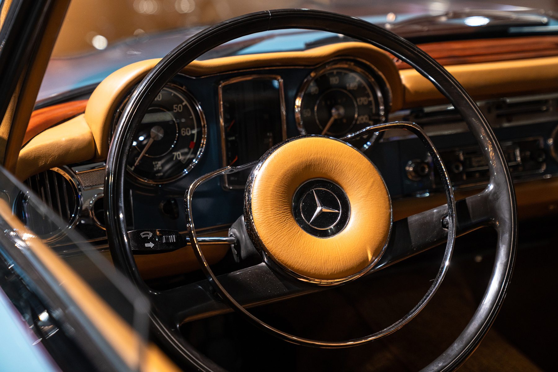 Detail of the original steering wheel and instruments of this 1965 Mercedes 230 SL Pagode
